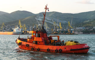 A red boat in the sea