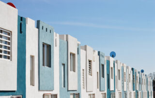 White and teal concrete buildings
