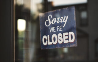 Blue and white sorry we re closed wooden signage